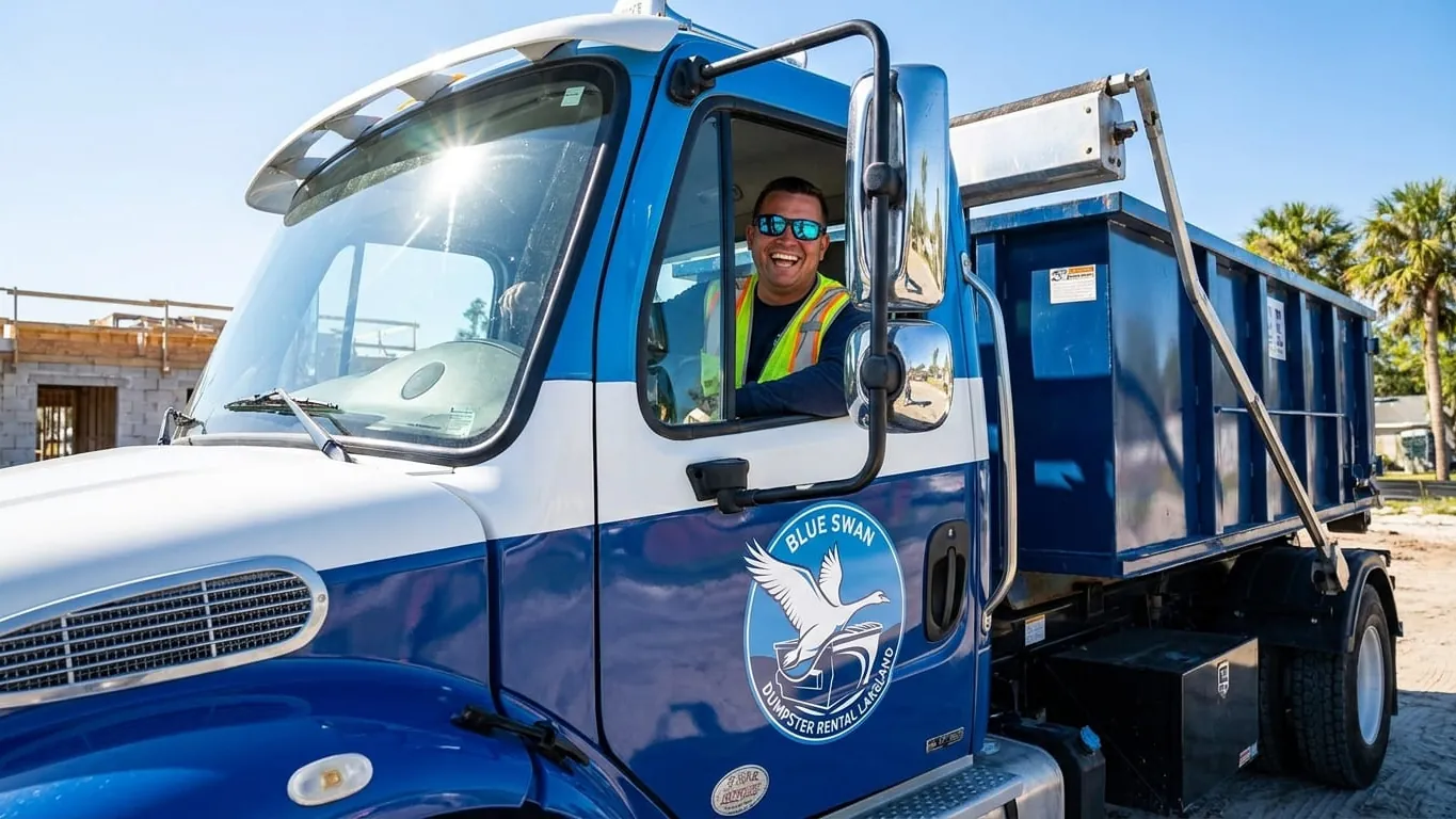 Blue Swan Dumpster Rental driver talking a customer through container placement in Lakeland, FL Blue Swan Dumpster Rental driver talking a customer through container placement in Lakeland, FL