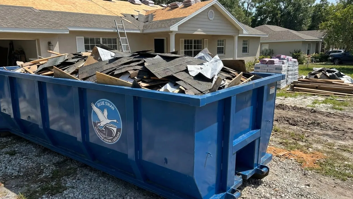 Roofing tear-off dumpster sizing in Lakeland, Florida — shingle layers loaded flat by weight, not by volume